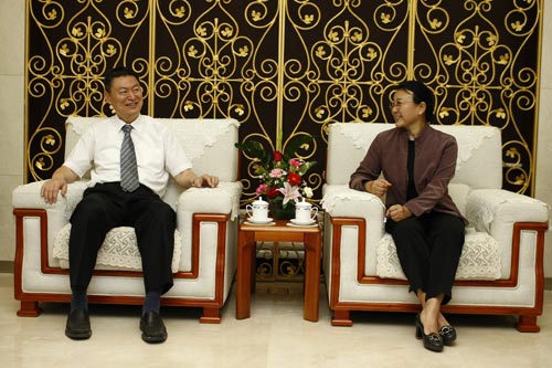 人民日报社副总编辑马利接见中国人民银行副行